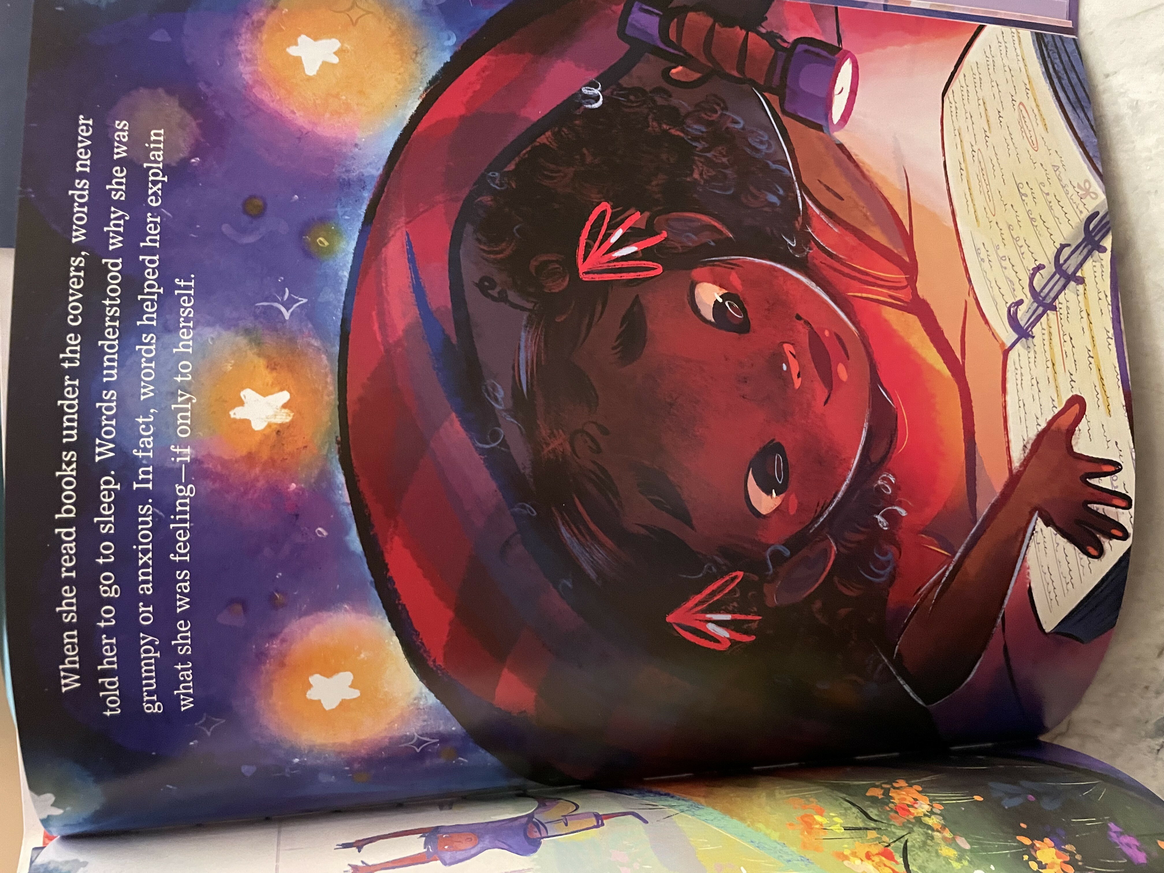 This picture shows a page of Stacey Abramsâ€™ book, Staceyâ€™s Extraordinary Words, where Stacey, a girl, is beneath her bed covers reading by flashlight.